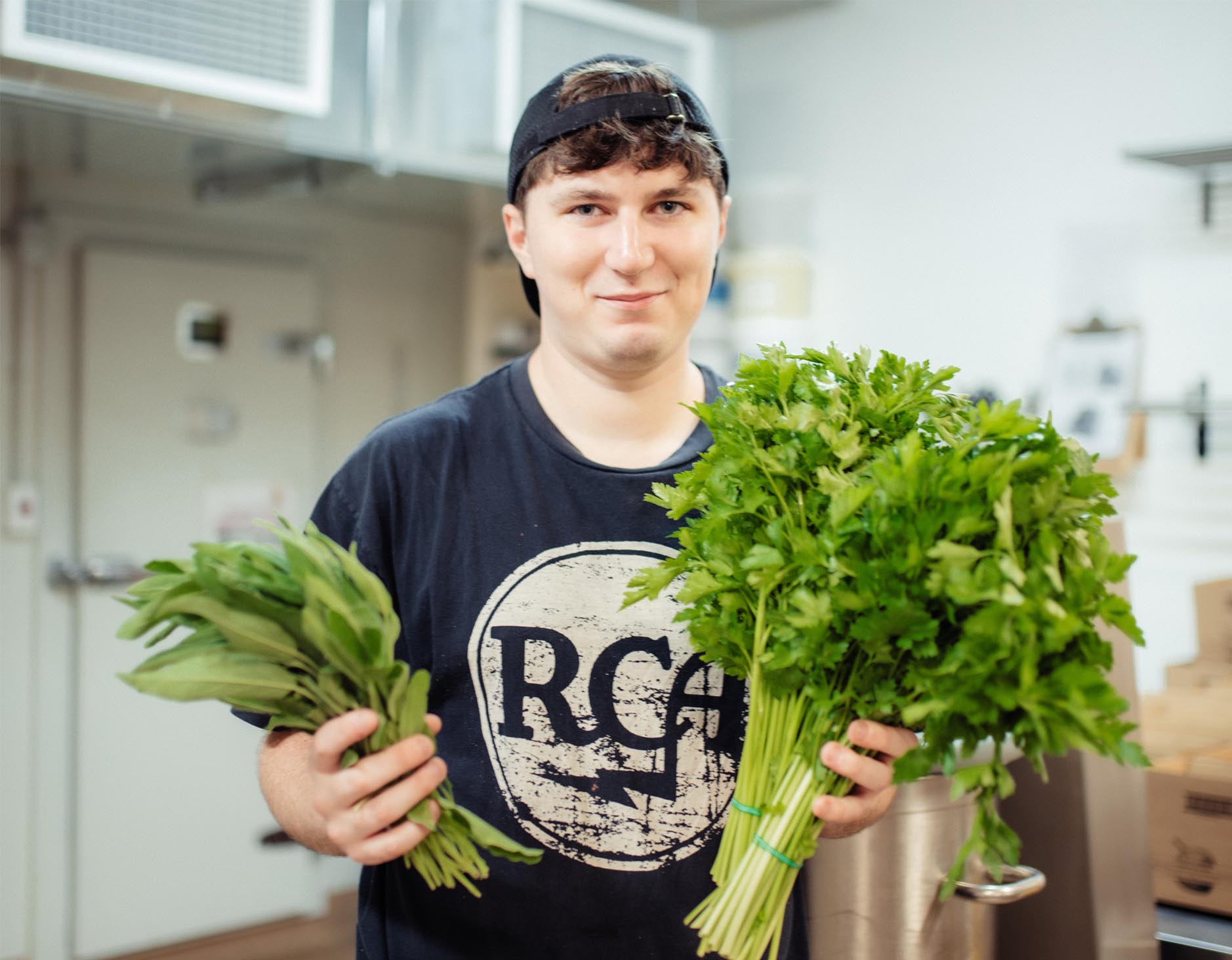 Jack Benwell holding some fresh greens