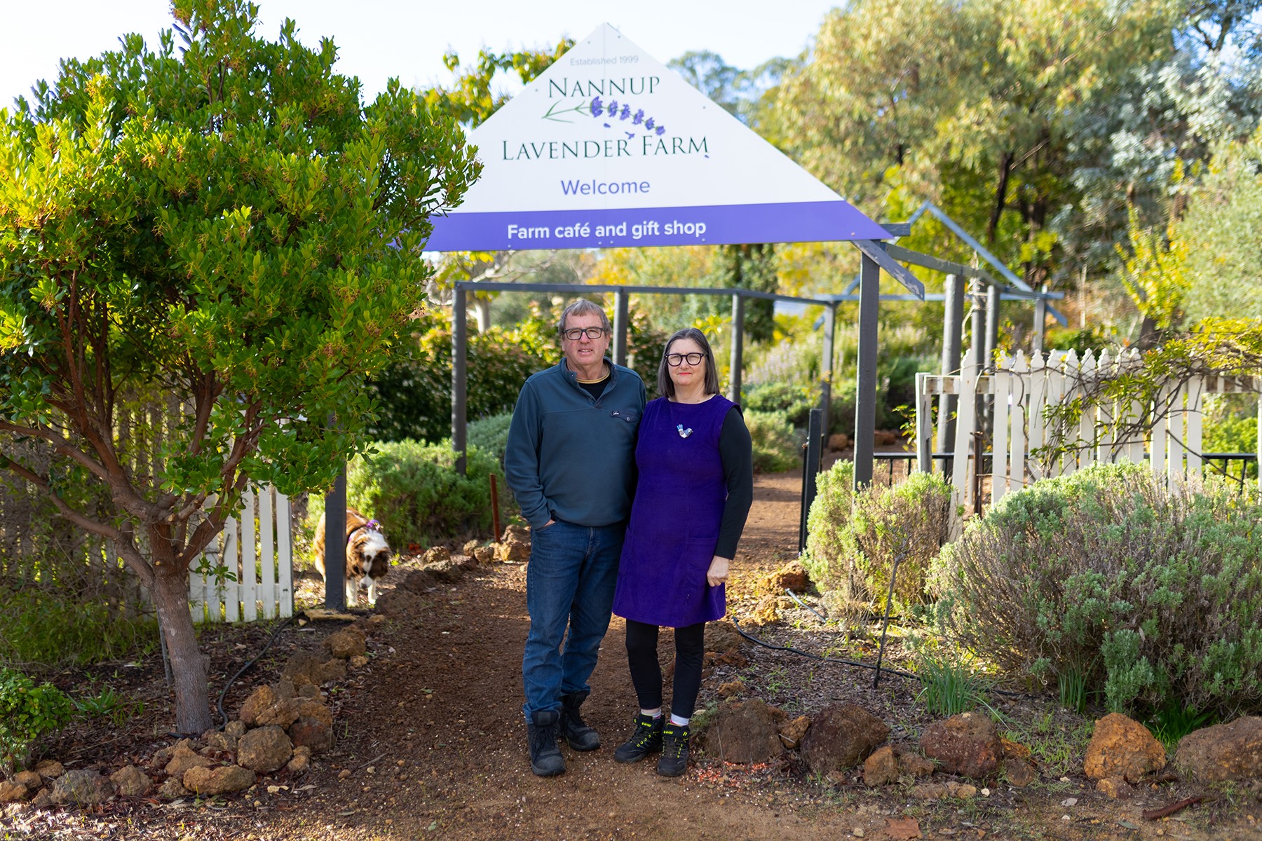 Heather Walford, owner of Nannup Lavender Farm, standing with her husband at the front gate of her business.