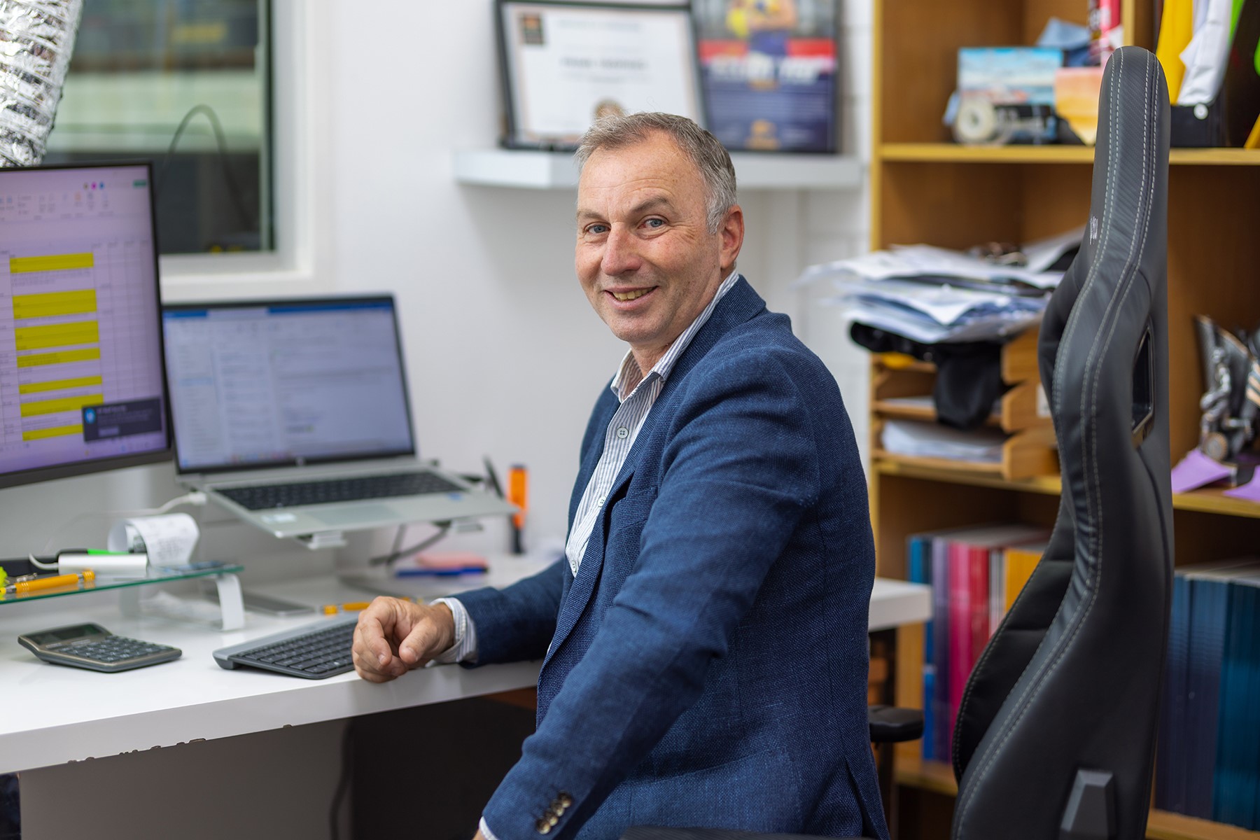 A man sitting in an office.