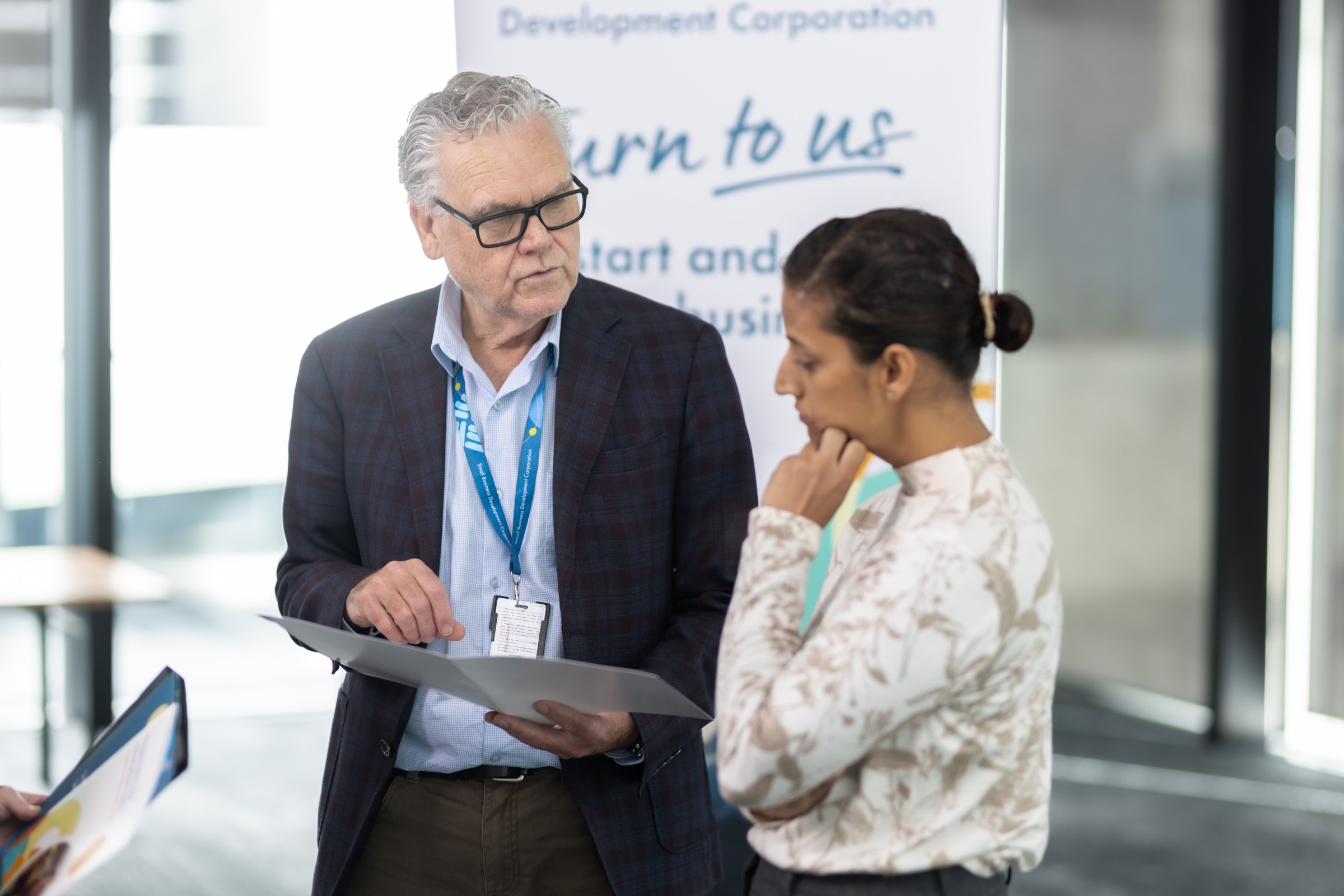Image showing SBDC advisor speaking with small business owner.