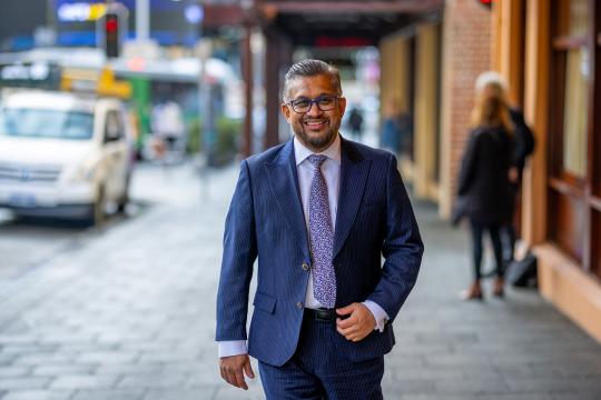 WA Small Business Commissioner Saj Abdoolakhan walking along William St in Perth''s CBD.