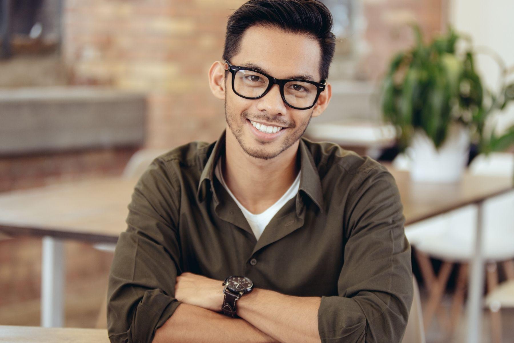 Photo of a man smiling.