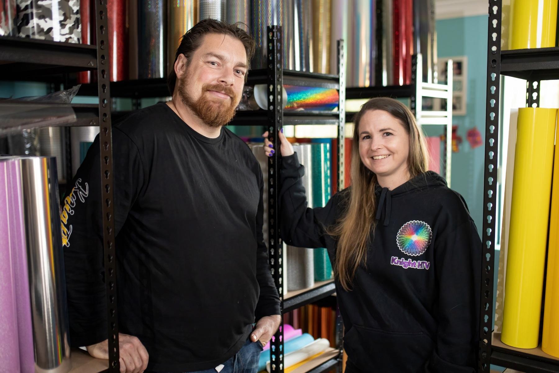 Photo of a man and woman in a printing business.