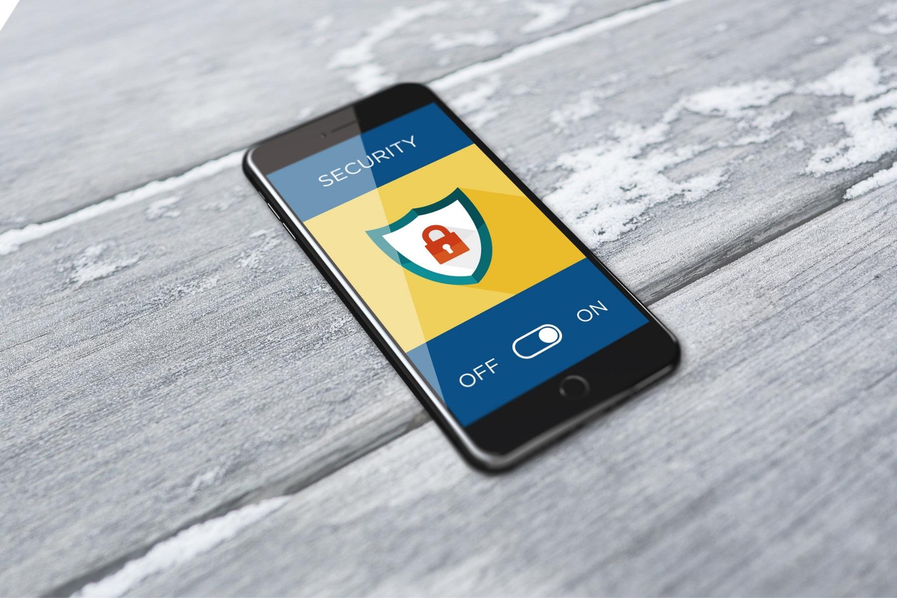 Photo of a smartphone with an alert to turn on security displaying on the screen.