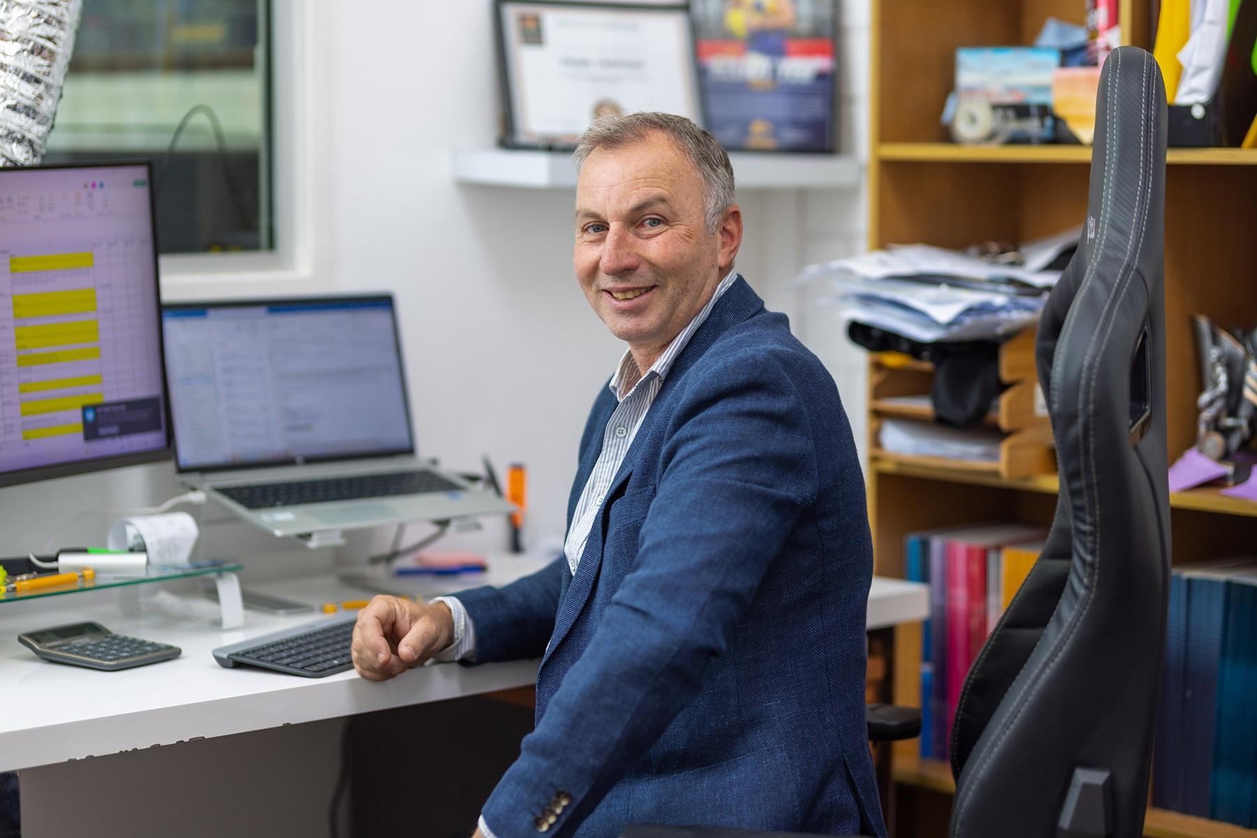 A man sitting in an office.
