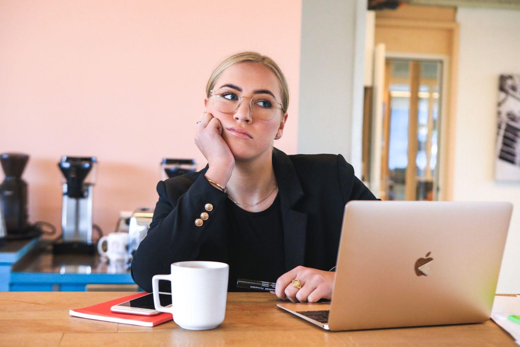 Photo of a woman looking frustrated.