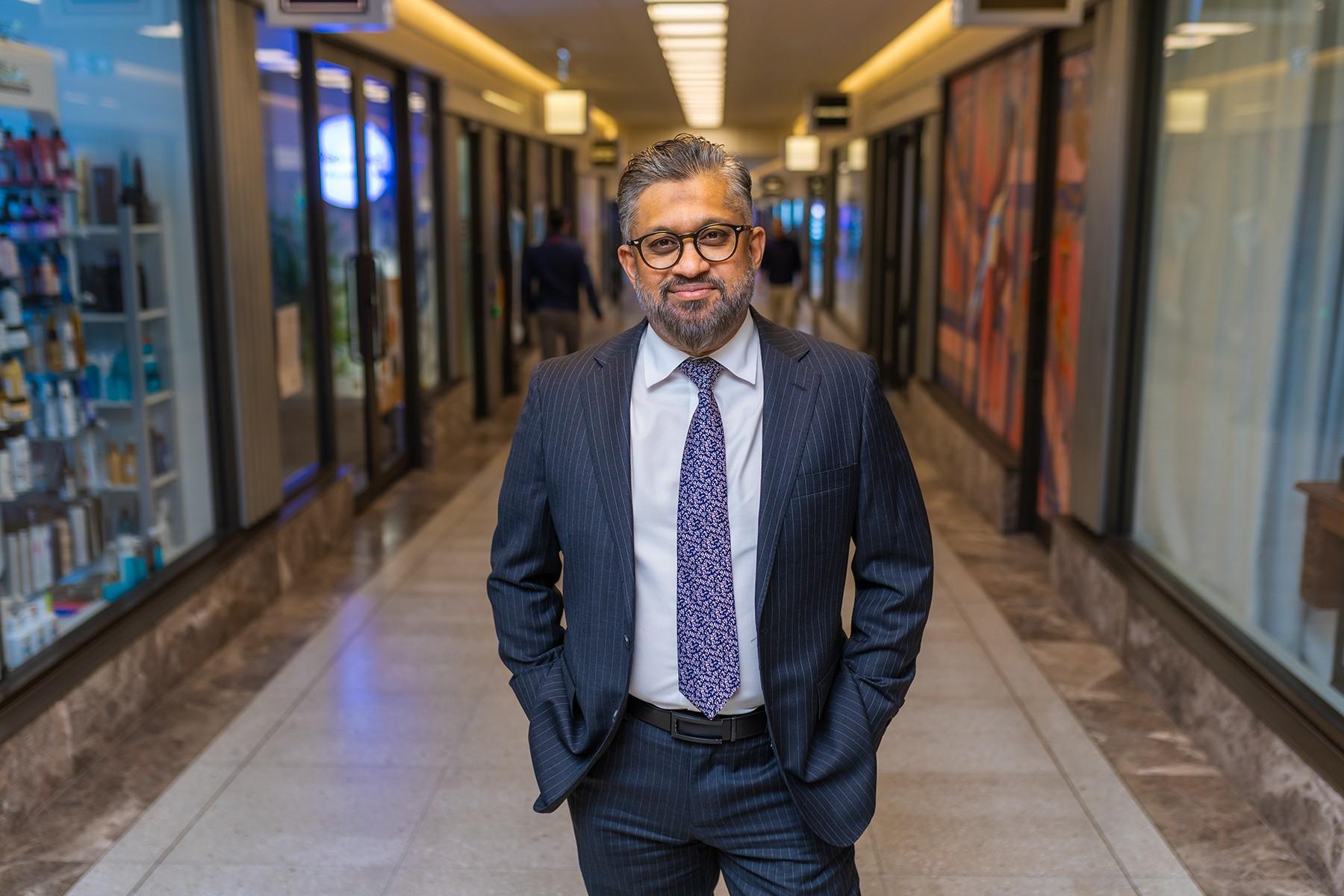 Small Business Commissioner Saj Abdoolakhan standing in Piccadilly Arcade in the Perth CBD.