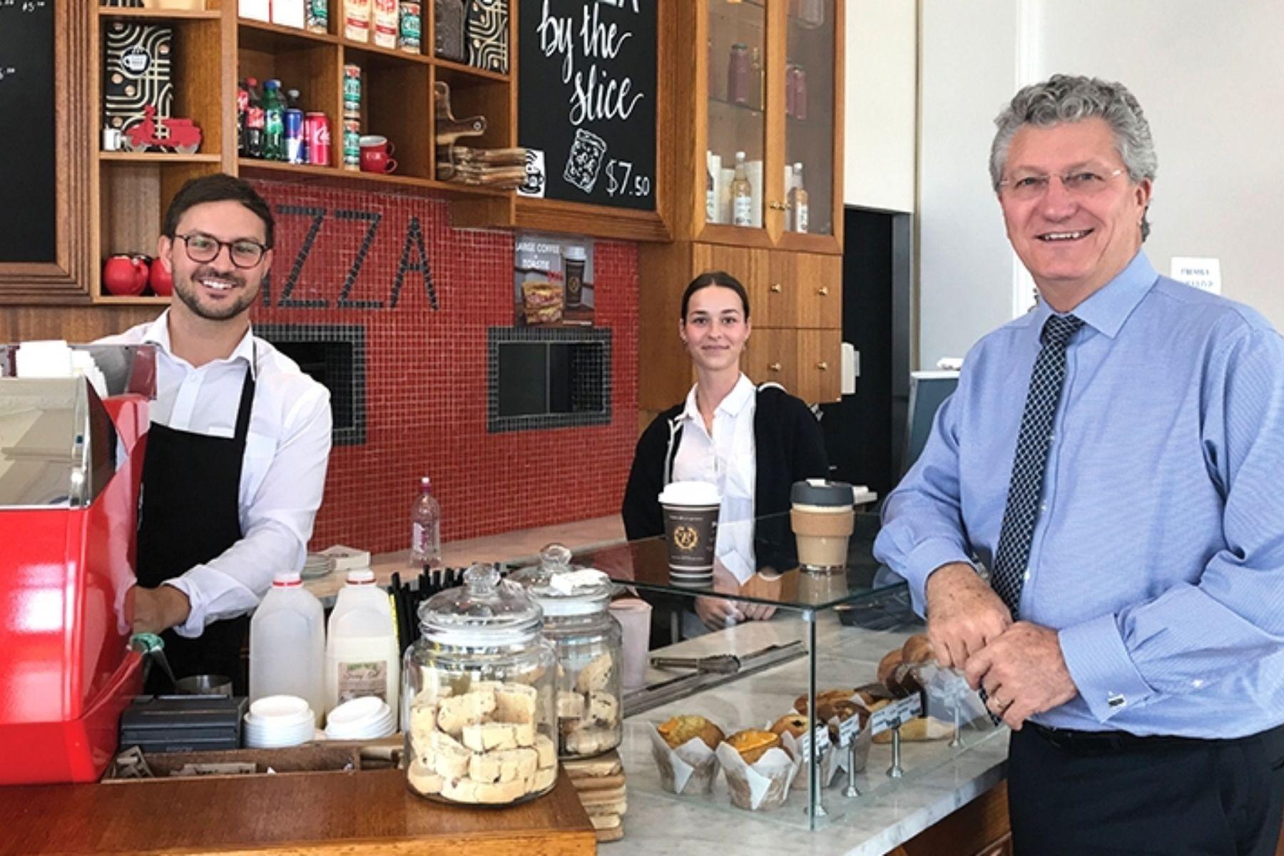 Photo of Small Business Commissioner David Eaton with staff at the Italian Corner cafe in Perth.