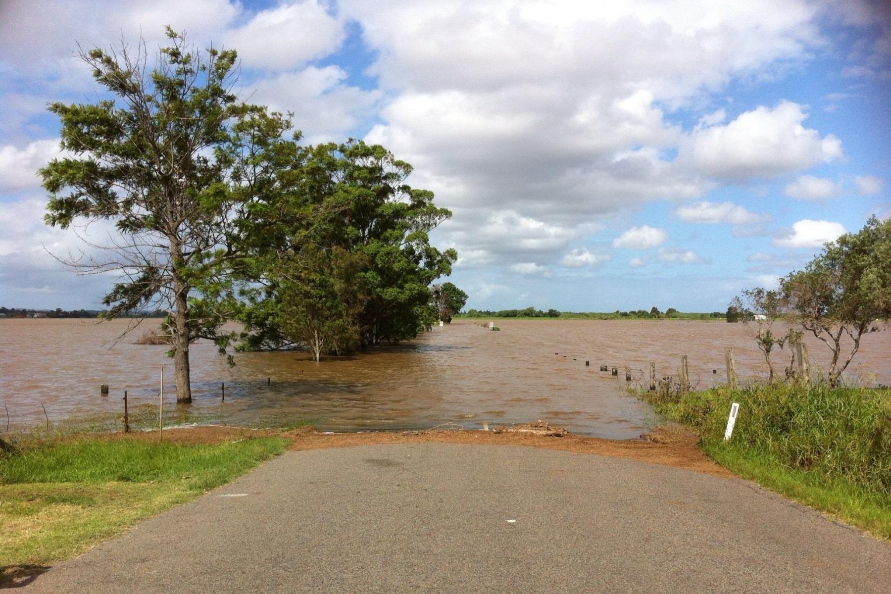Photo of a flooded road in a regional area.