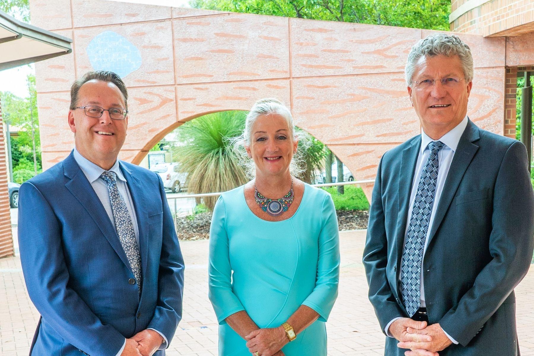 Photo of City of Rockingham CEO Daniel Simms and Mayor Tracey Roberts with Small Business Commissioner David Eaton.