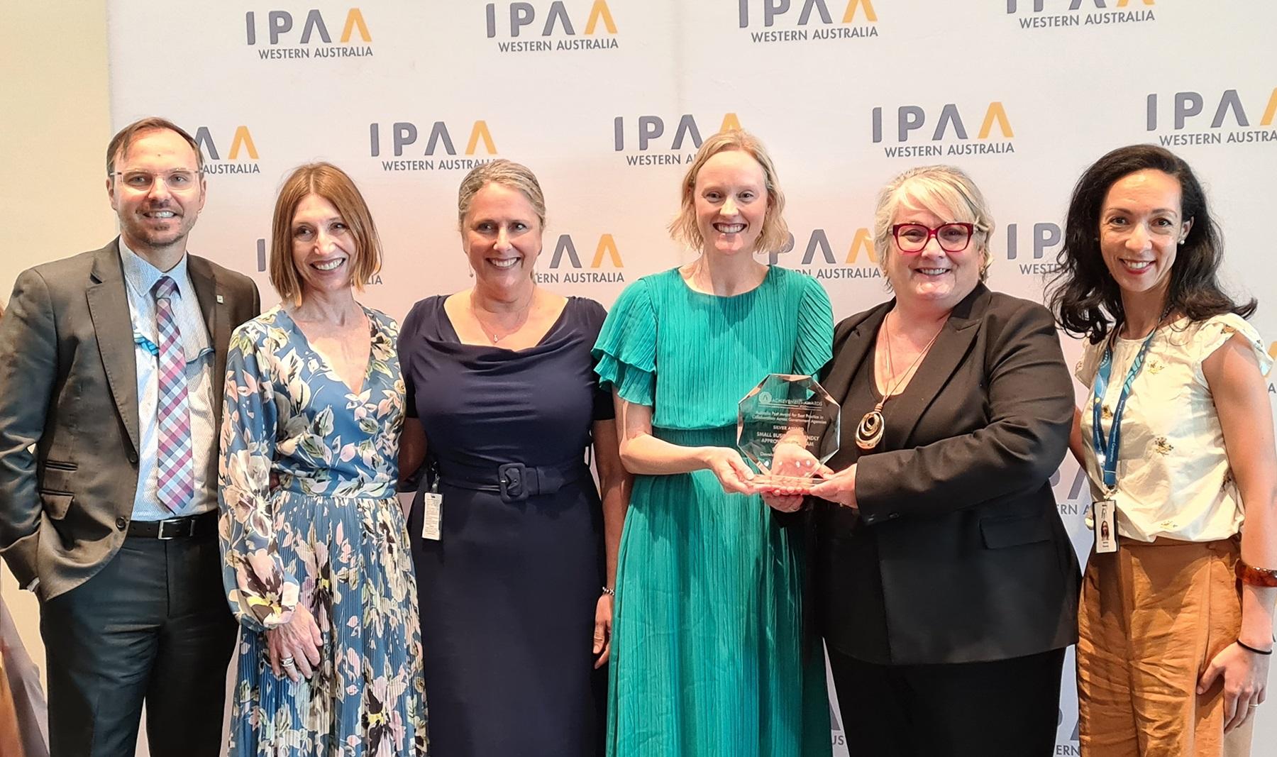 Photo of the SBDC's Small Business Friendly Approvals Program team with their award from the Institute of Public Administration Australia (IPAA) WA .